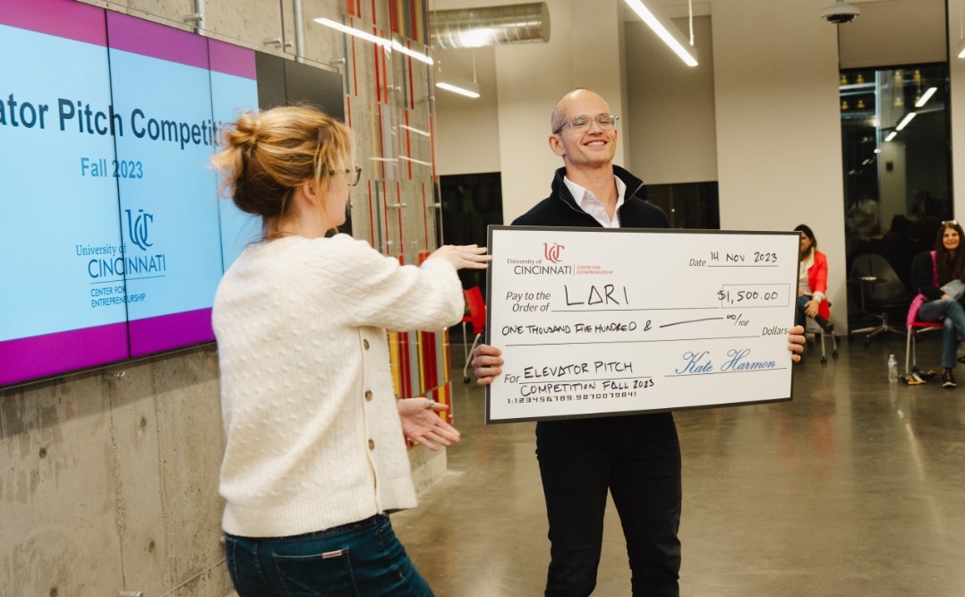 Students receive a big check