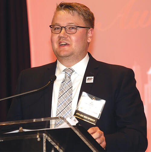 Zac Moore speaking at the 2019 UC Real Estate Center Dinner