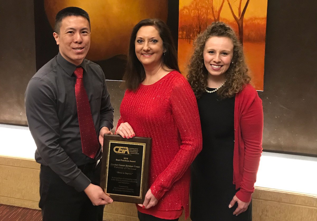 (L to R): Keith Sun, Lisa Forbes, and Amy Marcrum pose with the 2019 CEIA Best Practice Award plaque