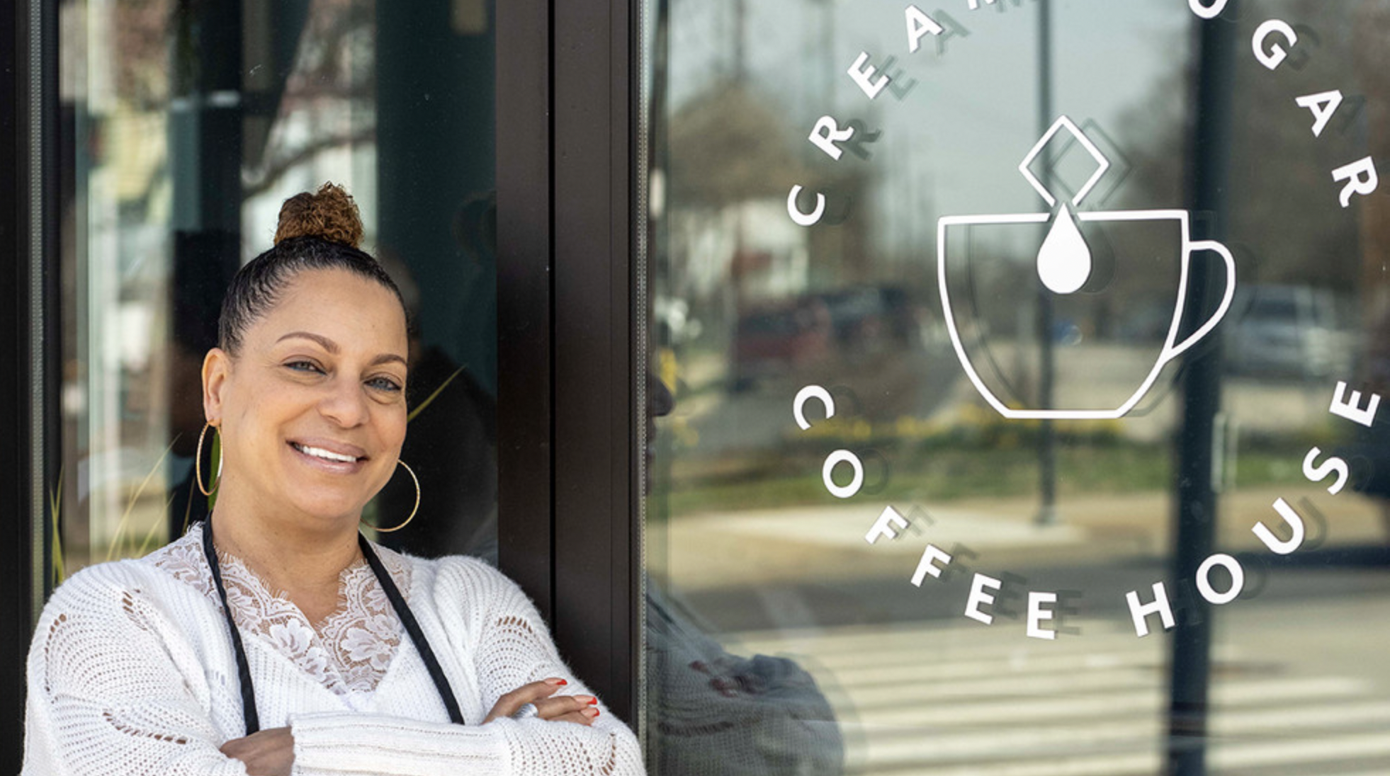 Taren Kinebrew in from of coffee shop